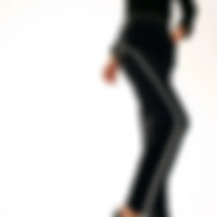 Elegant black pants with a striking side stripe showcased against a minimalist backdrop