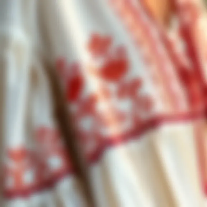 Intricate Embroidery on Bohemian Dress A close-up of intricate embroidery on a flowing bohemian dress