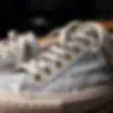 Intricate Details of Silver Glitter Sneakers Close-up of sparkling silver glitter sneakers showcasing intricate details