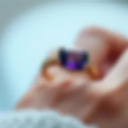 A close-up view of a minimalist amethyst ring showcasing its unique design