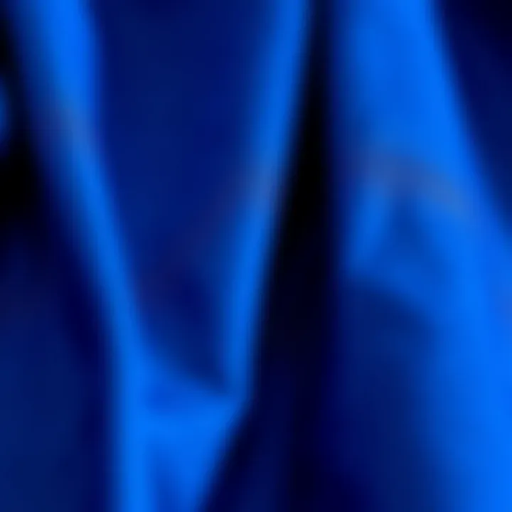 Close-up of royal blue fabric showcasing texture and quality