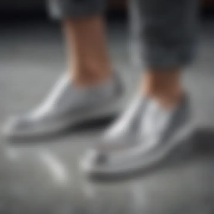 Close-up of silver slip-on shoes highlighting their unique texture