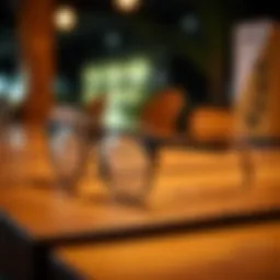 Stylish cycling glasses on a wooden table