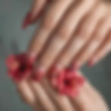 Close-up of hibiscus nail art showcasing intricate designs