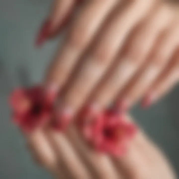 Close-up of hibiscus nail art showcasing intricate designs