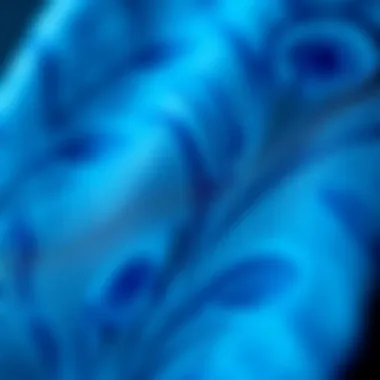 Intricate Texture of Peacock Blue Fabric Close-up of fabric texture of a peacock blue tie