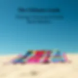 A vibrant beach blanket spread out on the sand under a clear blue sky