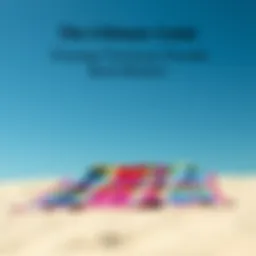 A vibrant beach blanket spread out on the sand under a clear blue sky