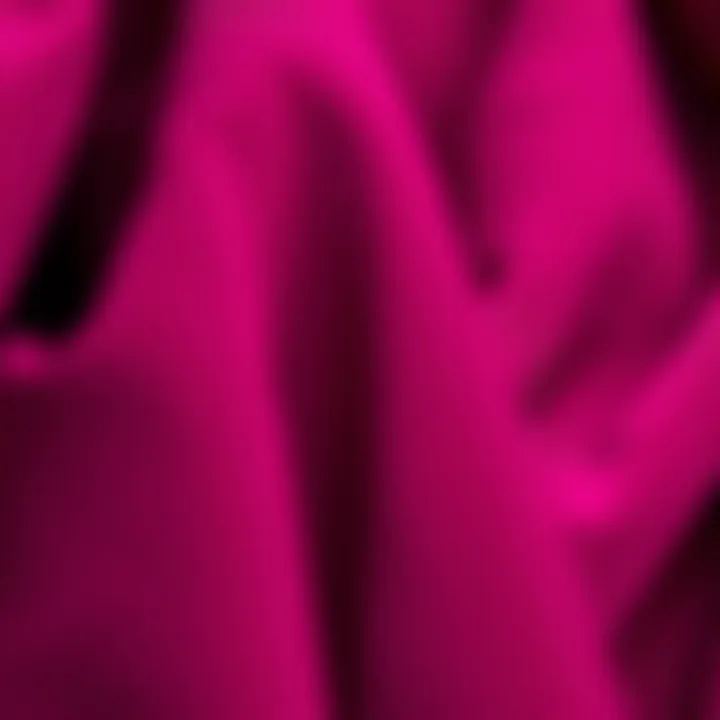 Close-up of luxurious fabric textures in magenta hues