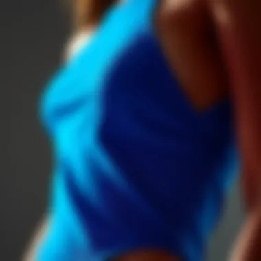 Craftsmanship: Neon Blue Bodysuit Fabric Exploration A close-up of high-quality fabric and intricate details of a neon blue bodysuit, emphasizing craftsmanship.