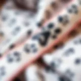 A close-up of a paw print ribbon woven into fabric