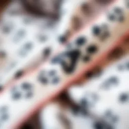 A close-up of a paw print ribbon woven into fabric