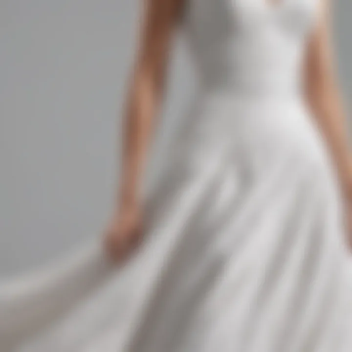 Close-up of the fabric texture of a white dress with a detachable train